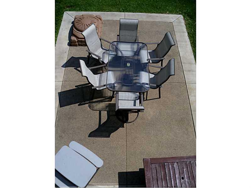 110 Shenango Road New Castle, PA 16105 - Photo 22 of 25 Patio/Deck. Large Cement Patio overlooking your BeautifulBackyuard Santurary