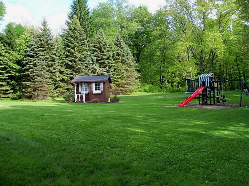 110 Shenango Road New Castle, PA 16105 - Photo 6 of 25 Exterior Back. What a yard to relax and entertain in , or just enjoy the sights and sound of nature at its best