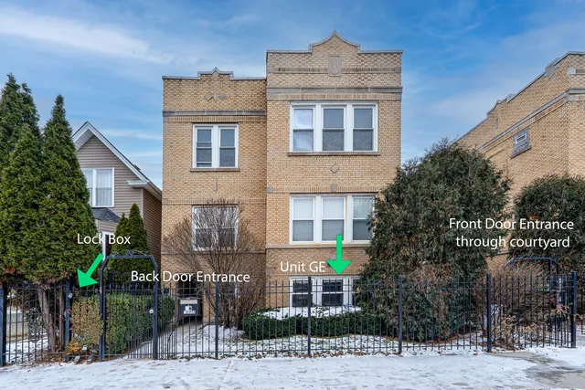 a front view of a building with garden