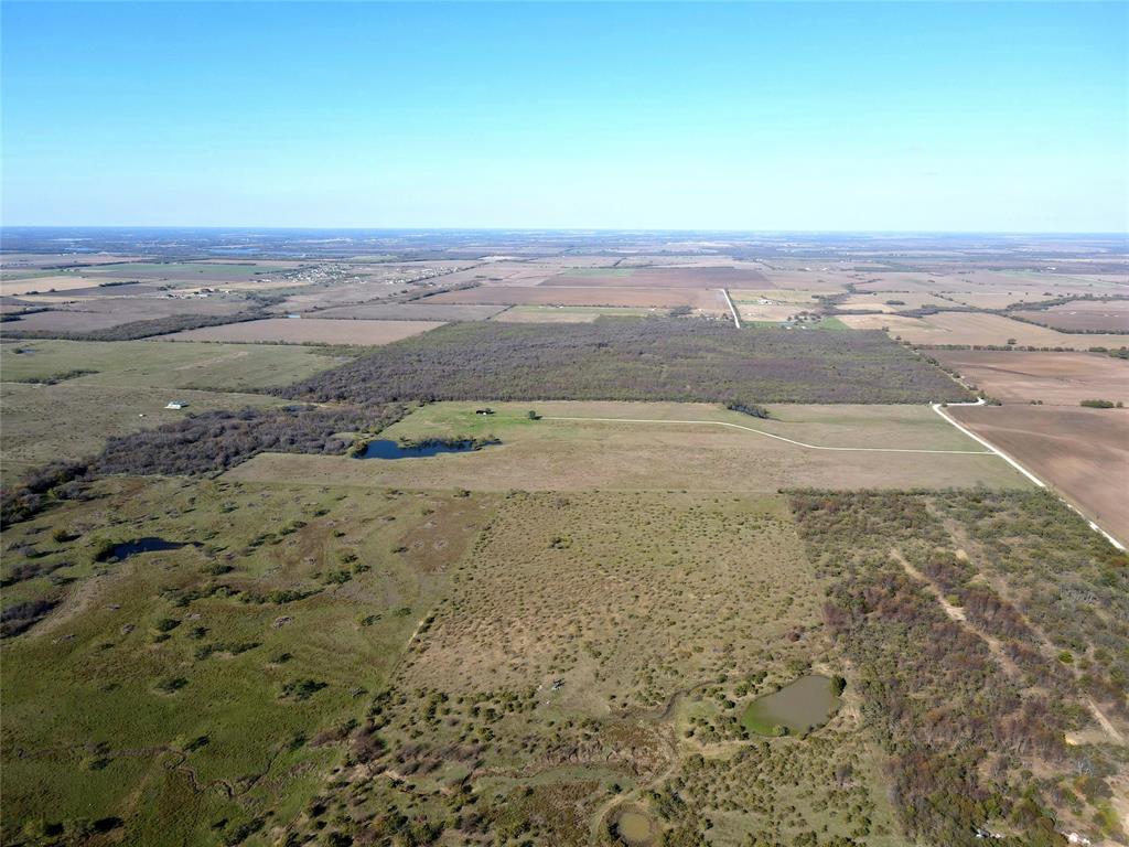 16531 Farm To Market 455 Pilot Point, TX 76258 - Photo 29 of 37 a view of beach and an ocean beach