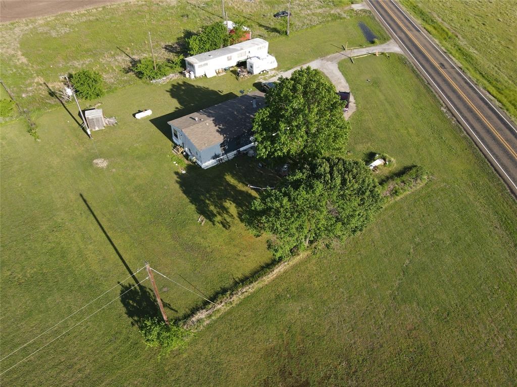 16531 Farm To Market 455 Pilot Point, TX 76258 - Photo 5 of 37 an aerial view of a residential houses with outdoor space and swimming pool