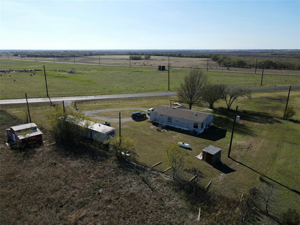 16531 Farm To Market 455 Pilot Point, TX 76258 - Photo 10 of 37 an aerial view of a house with a lake view