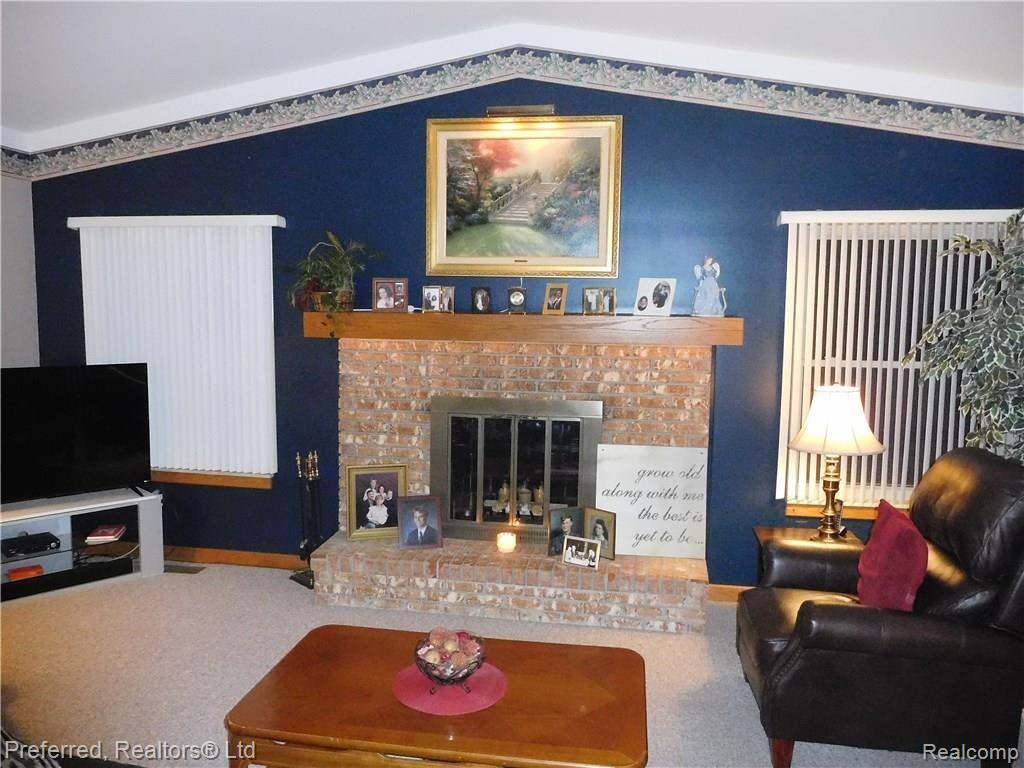 43697 Oakbrook Road Canton, MI 48187 - Photo 15 of 28 FIREPLACE IN FAMILY ROOM