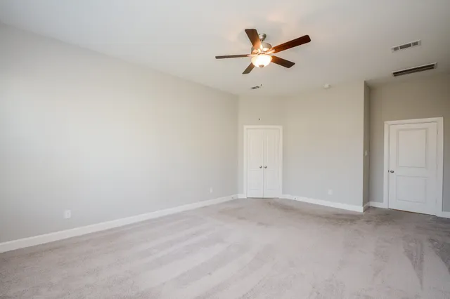 a white bath tub sitting in a bathroom