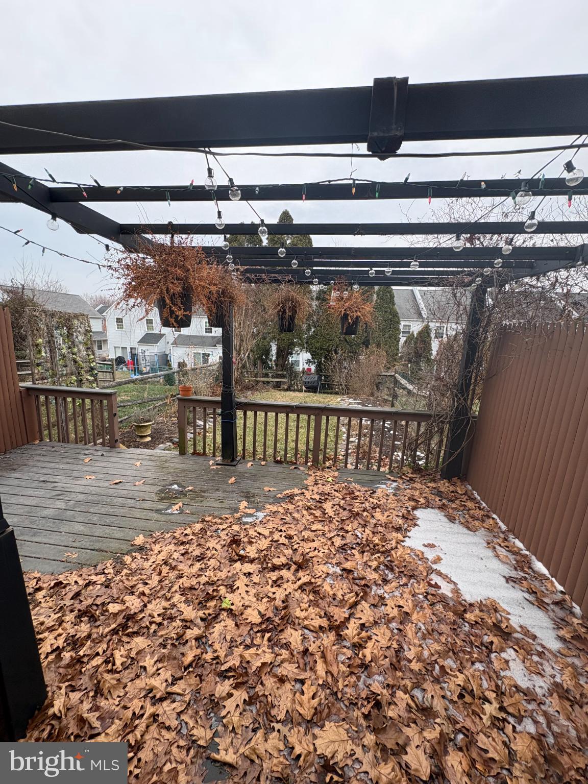 1531 Tarleton Place Warminster, PA 18974 - Photo 23 of 25 Charming deck adorned with autumn leaves.
