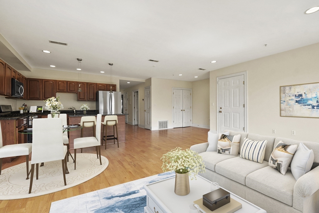 1306 Columbia Road, Unit 3E Boston, MA 02127 - Photo 20 of 40 a living room with furniture and kitchen view