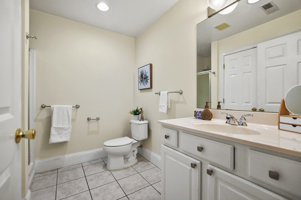 1306 Columbia Road, Unit 3E Boston, MA 02127 - Photo 26 of 40 a view of bathroom with a sink mirror and toilet