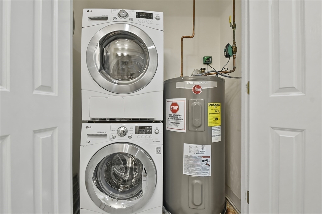 1306 Columbia Road, Unit 3E Boston, MA 02127 - Photo 30 of 40 a utility room with dryer and washer