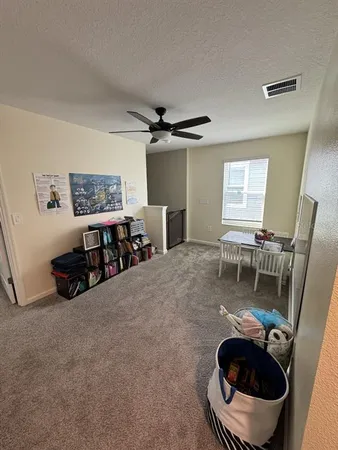 a room with furniture and a chair