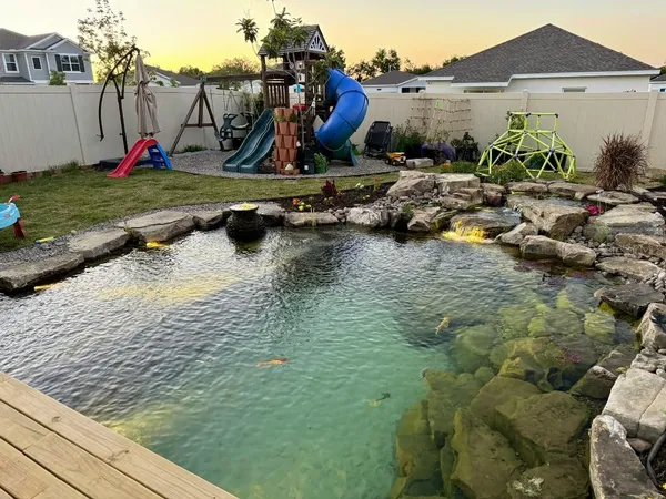 a view of a lake with a house