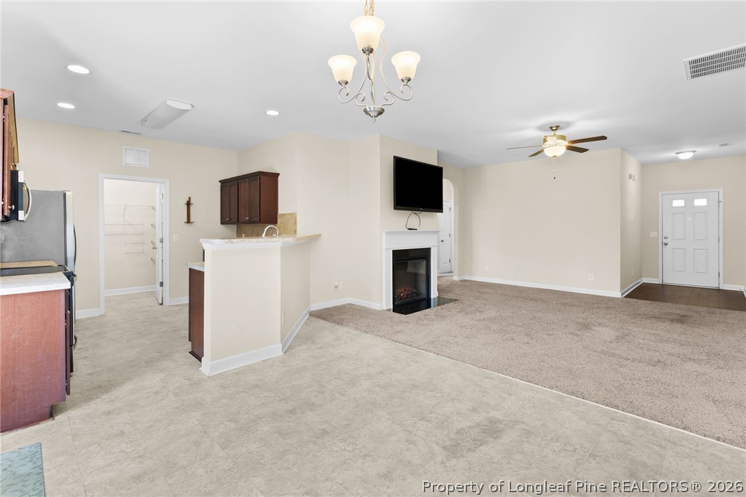 216 Meherrin Loop Raeford, NC 28376 - Photo 10 of 38 a view of a livingroom with a flat screen tv