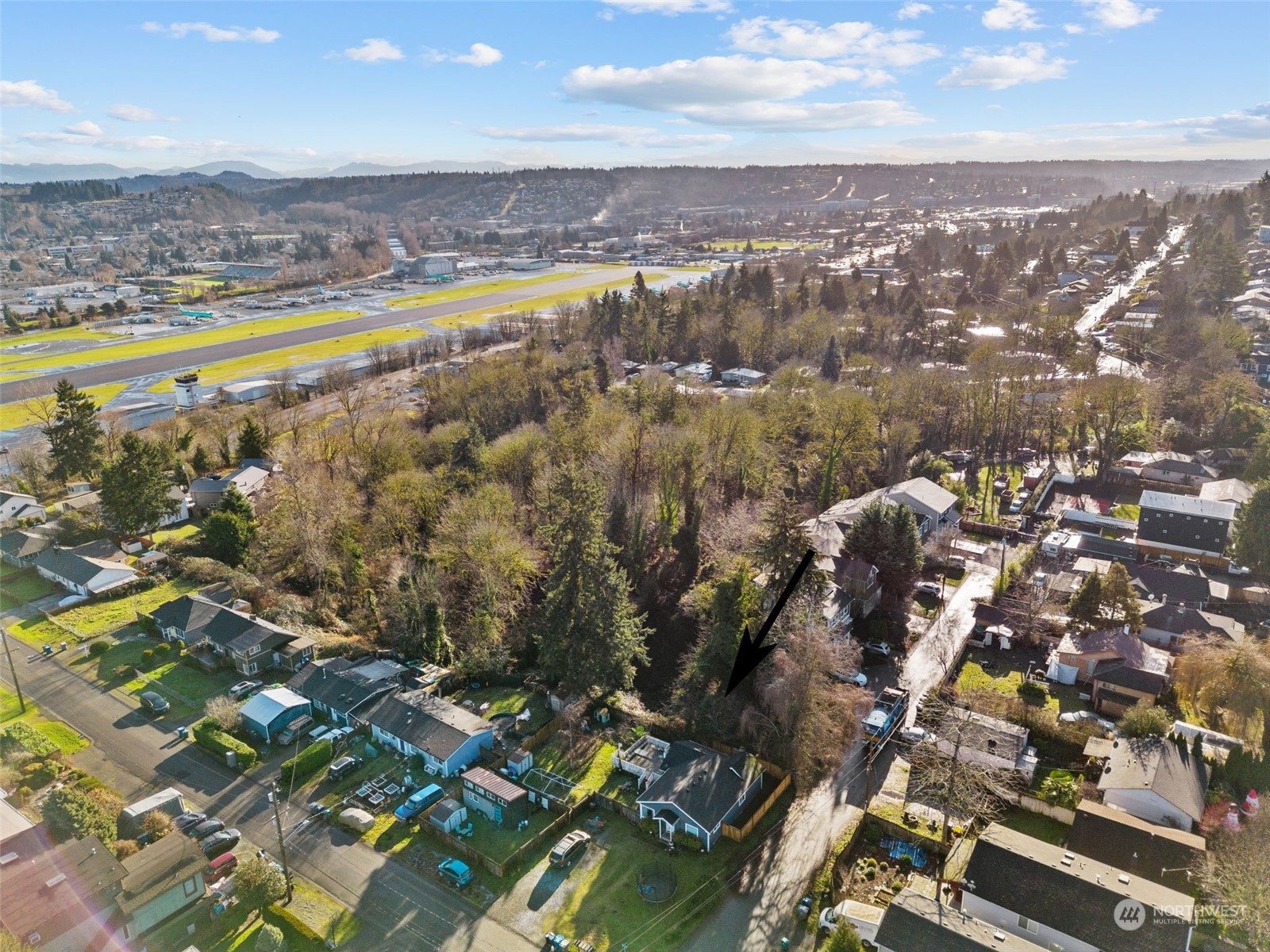 315 Lind Avenue Northwest Renton, WA 98057 - Photo 11 of 16 an aerial view of residential building with parking space