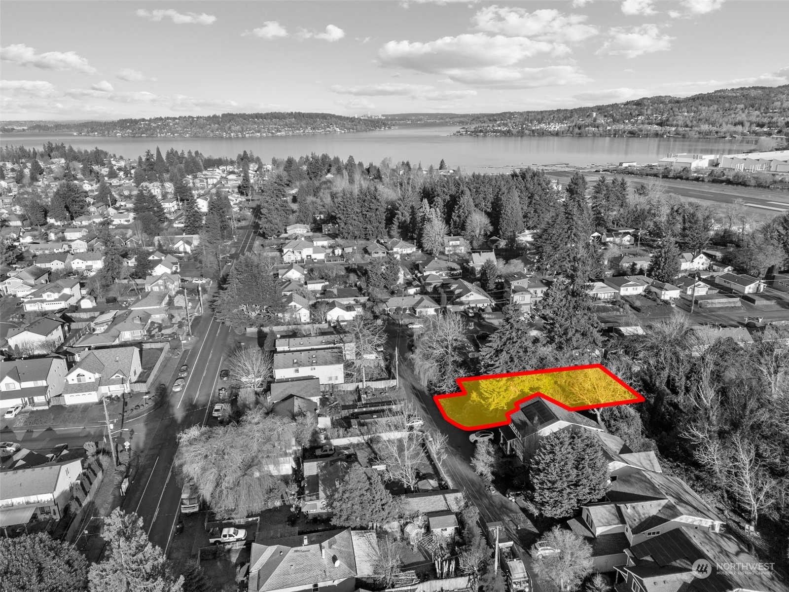 315 Lind Avenue Northwest Renton, WA 98057 - Photo 14 of 16 an aerial view of residential houses with outdoor space and swimming pool