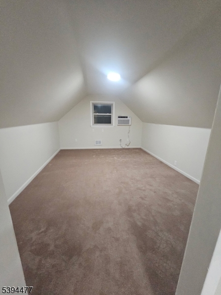 38 Riverview Circle Little Falls, NJ 07424 - Photo 4 of 4 an empty room with a empty space and a window