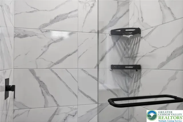 a water heater on a granite counter top