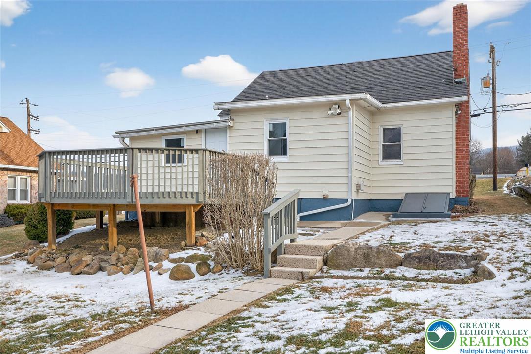 2375 East Lizard Creek Road Lehighton, PA 18235 - Photo 35 of 42 a view of a patio with a table and chairs and barbeque grill