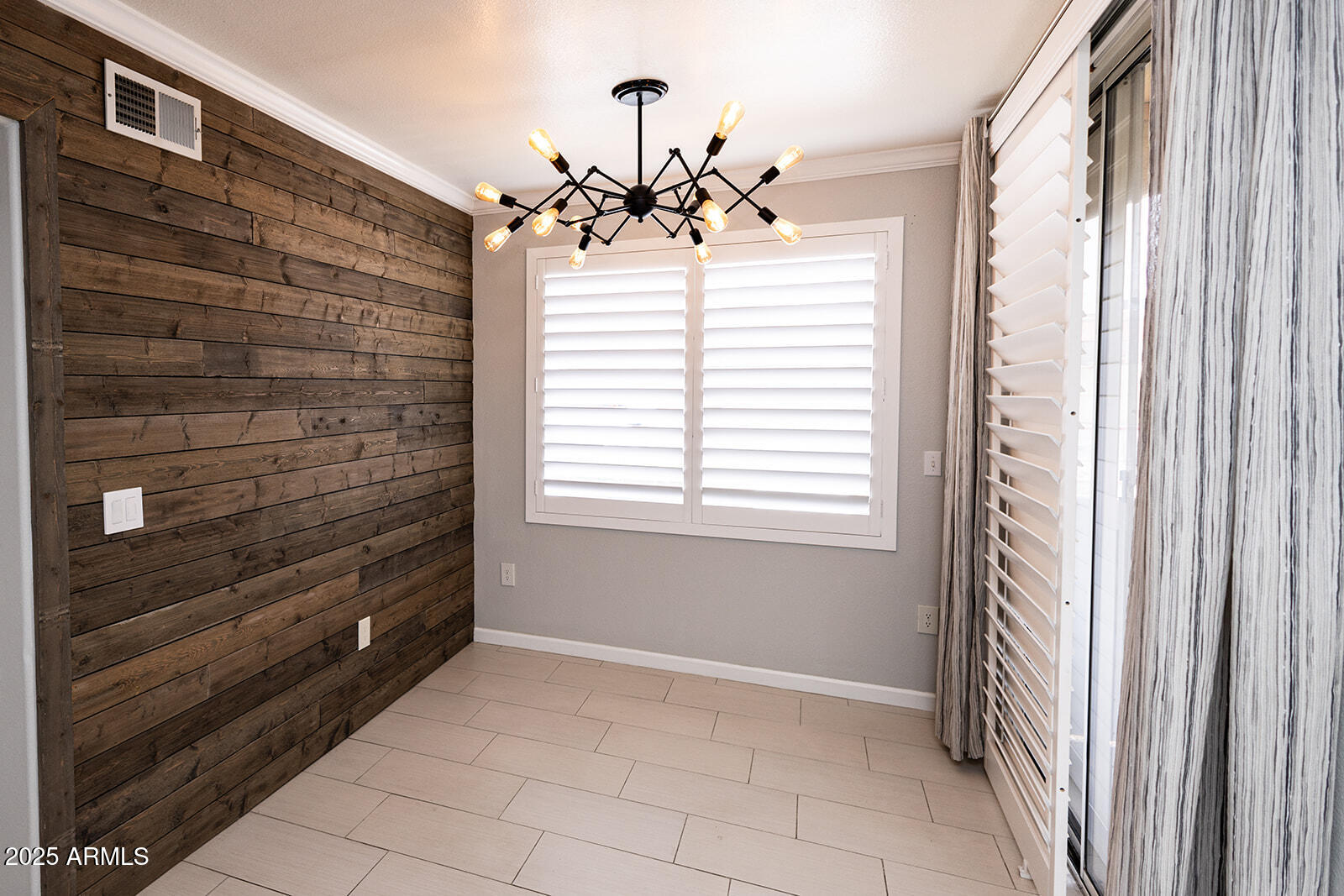 2134 East Broadway Road, Unit 1016 Tempe, AZ 85282 - Photo 13 of 33 a view of an entryway with a chandelier