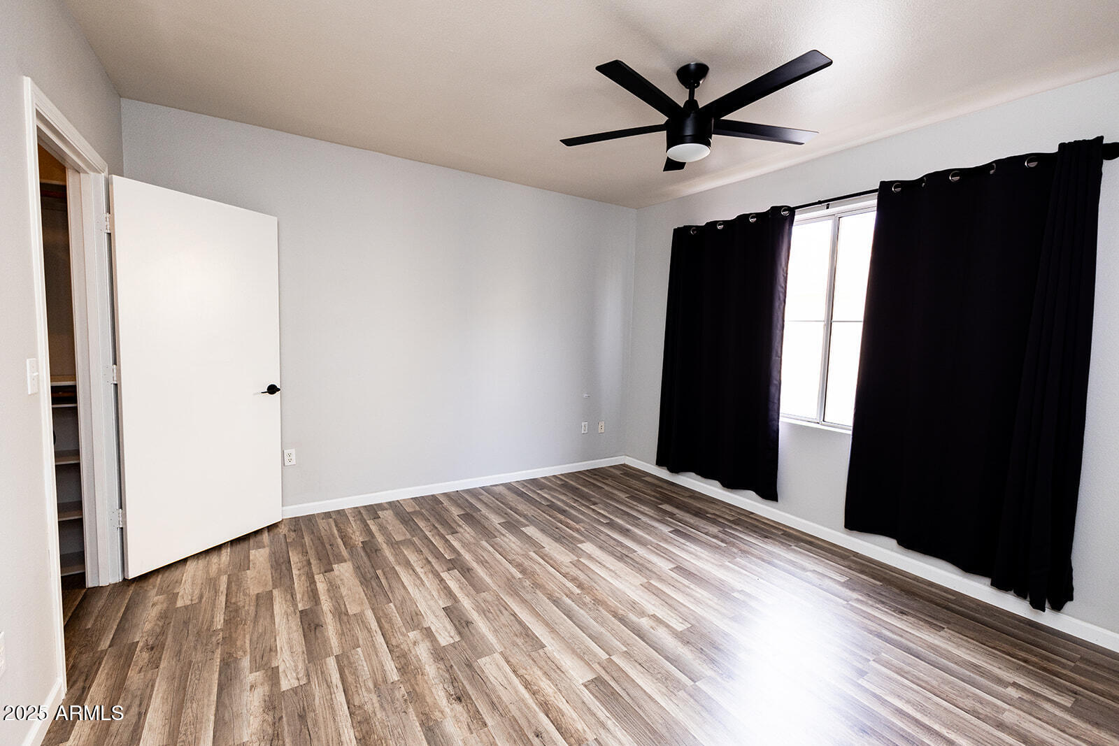 2134 East Broadway Road, Unit 1016 Tempe, AZ 85282 - Photo 16 of 33 a view of a livingroom with a ceiling fan and window