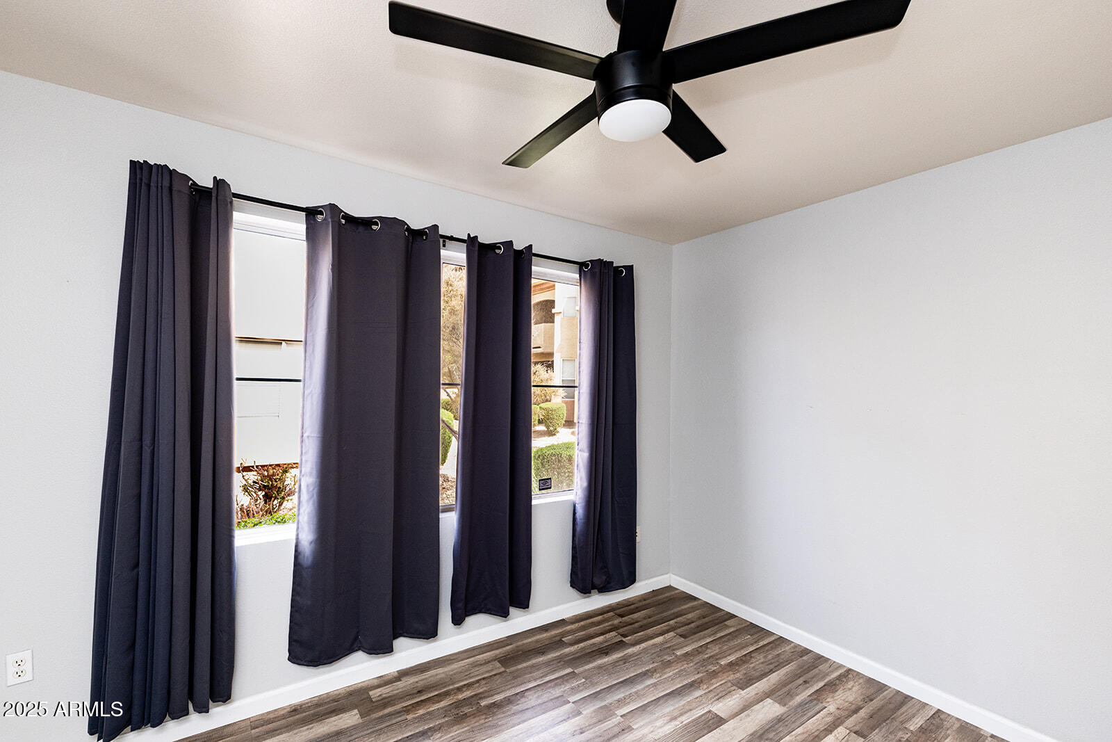 2134 East Broadway Road, Unit 1016 Tempe, AZ 85282 - Photo 17 of 33 wooden floor in an empty room