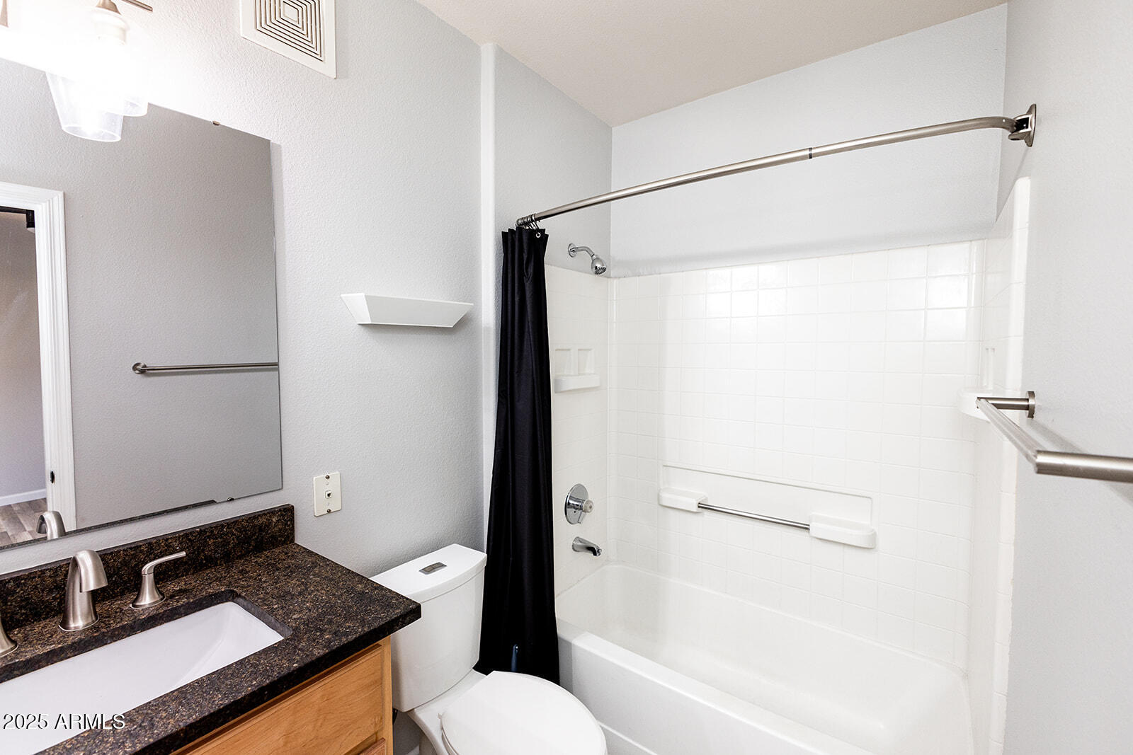 2134 East Broadway Road, Unit 1016 Tempe, AZ 85282 - Photo 20 of 33 a bathroom with a granite countertop sink toilet and shower