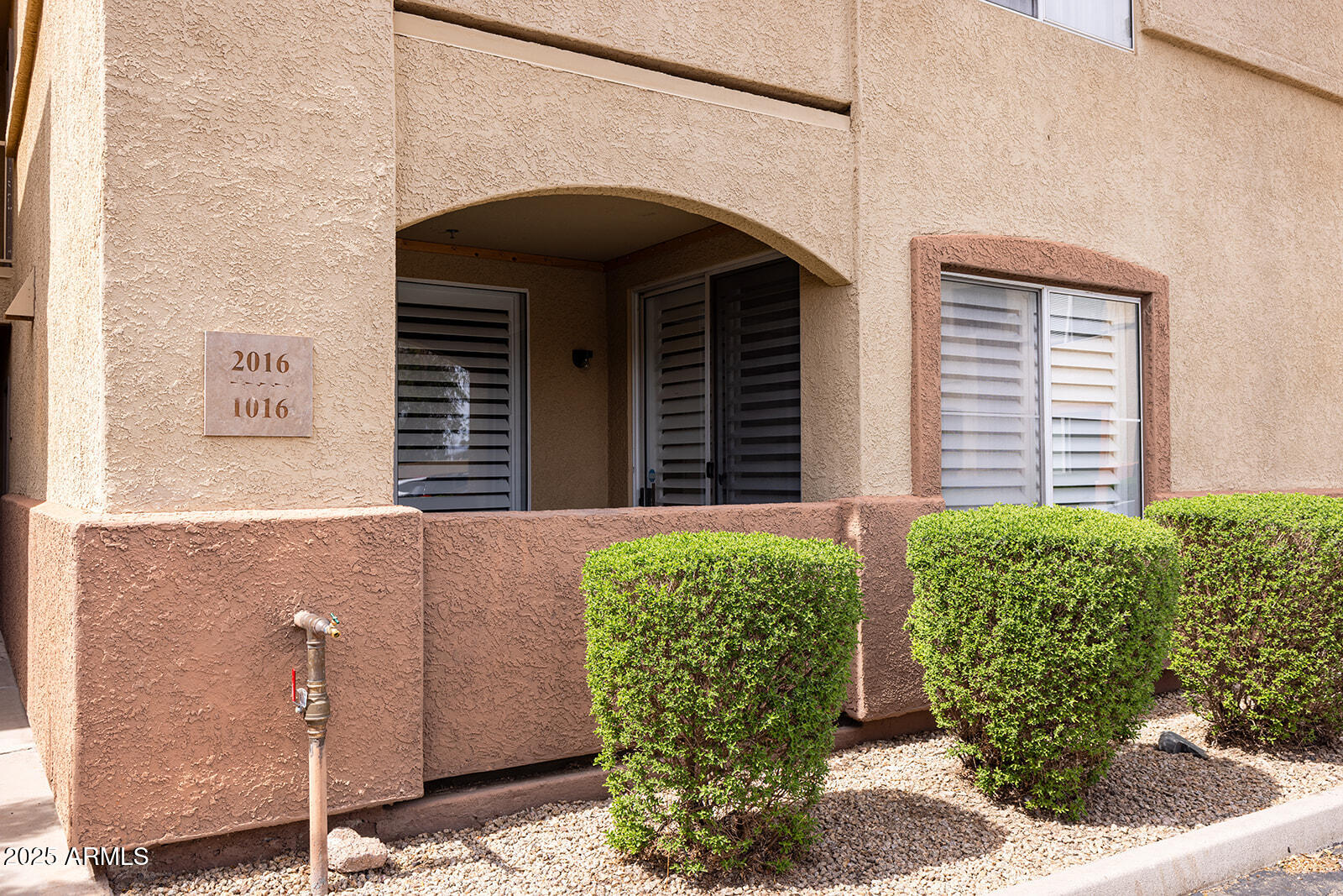 2134 East Broadway Road, Unit 1016 Tempe, AZ 85282 - Photo 2 of 33 a front view of a house