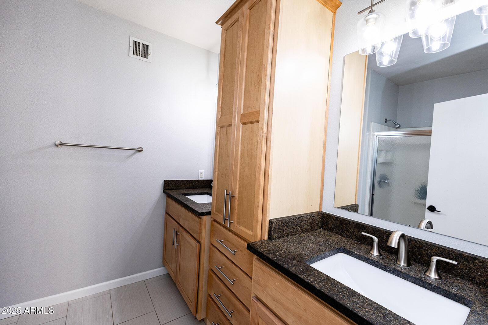 2134 East Broadway Road, Unit 1016 Tempe, AZ 85282 - Photo 24 of 33 a bathroom with a granite countertop sink and a mirror