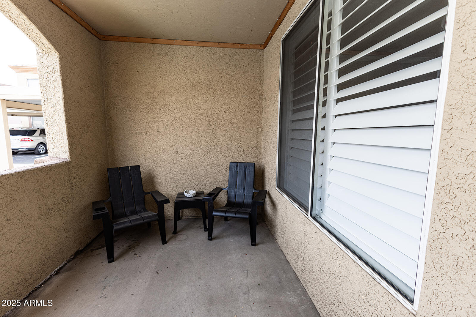2134 East Broadway Road, Unit 1016 Tempe, AZ 85282 - Photo 25 of 33 a living room with furniture and a window