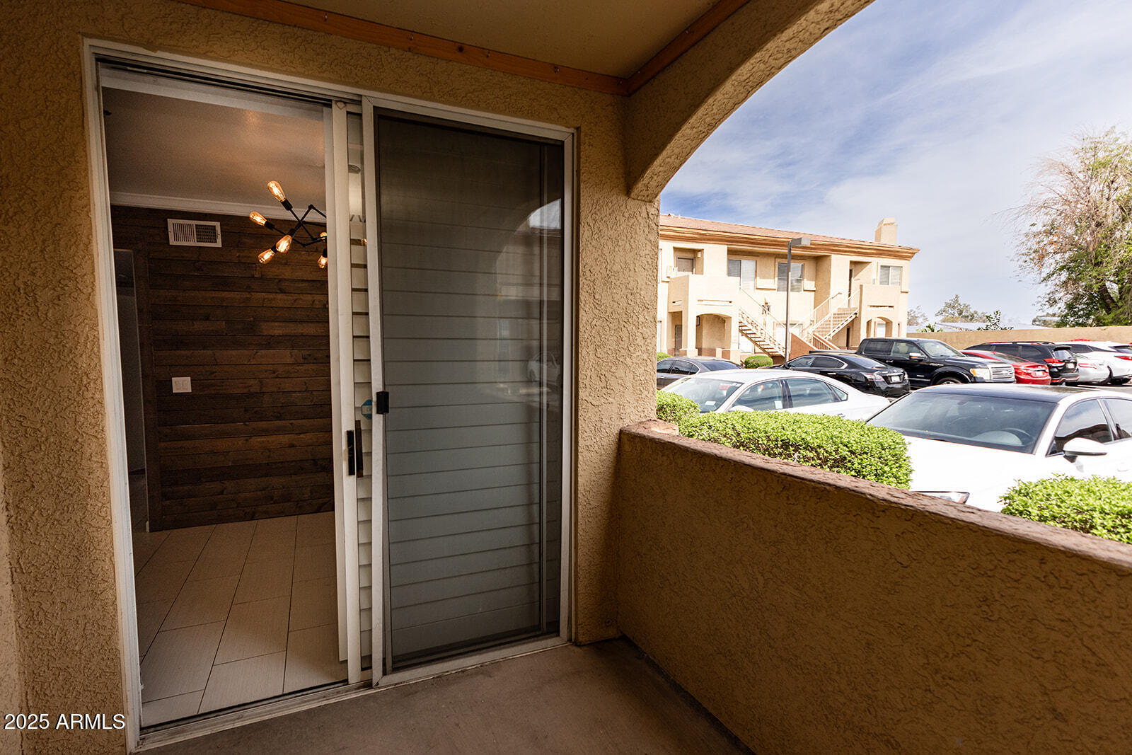 2134 East Broadway Road, Unit 1016 Tempe, AZ 85282 - Photo 26 of 33 a view of outdoor space kitchen and patio