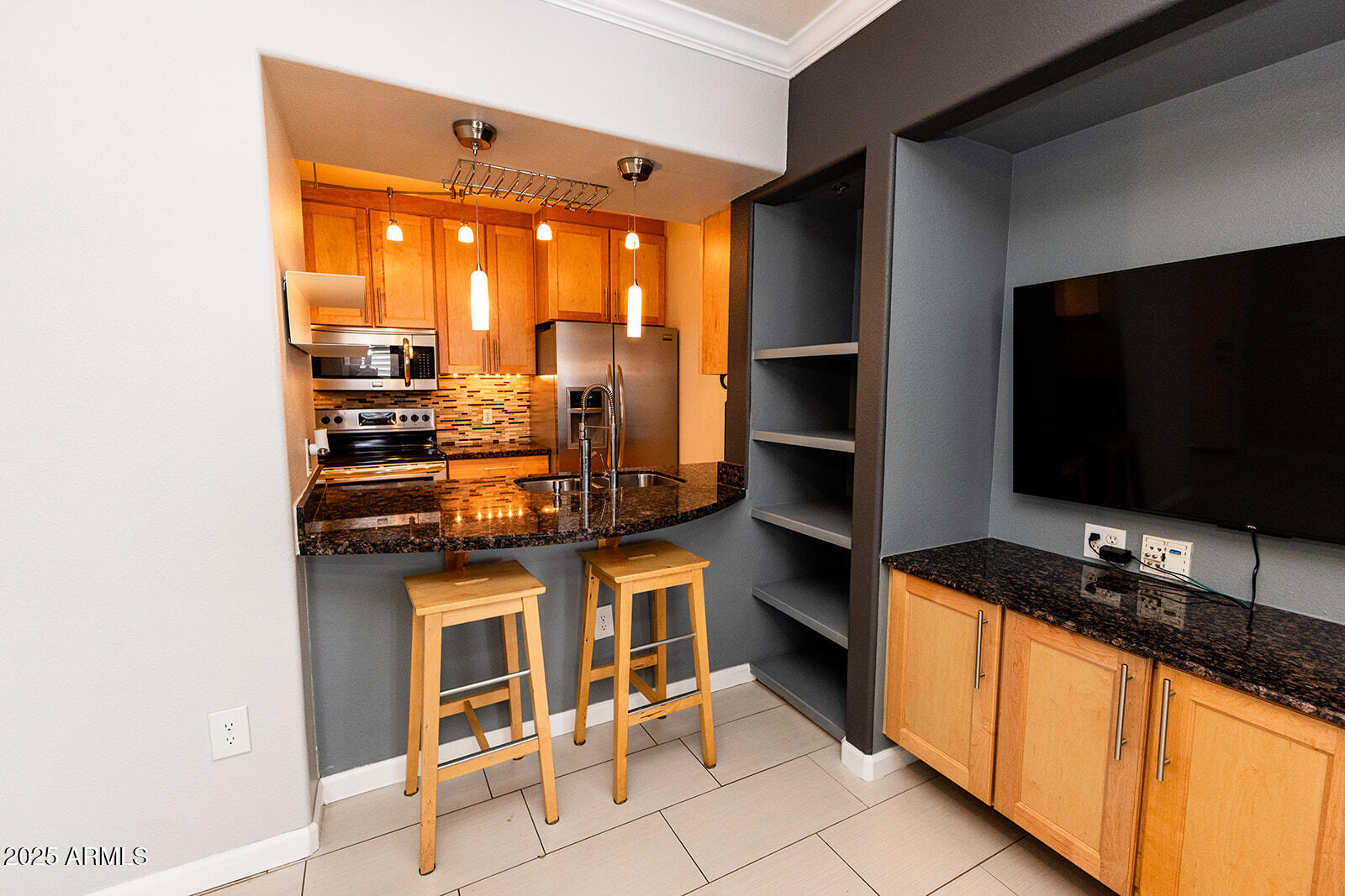 2134 East Broadway Road, Unit 1016 Tempe, AZ 85282 - Photo 10 of 33 a living room with flat screen tv and outdoor view