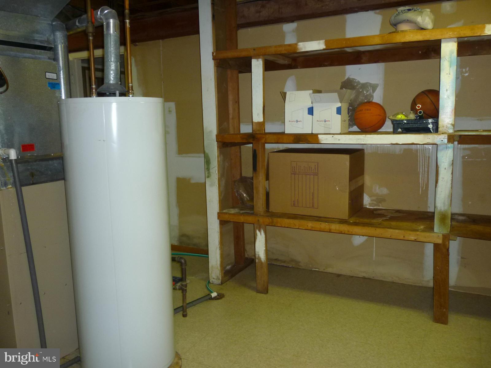 14900 Peach Orchard Road Silver Spring, MD 20905 - Photo 29 of 30 Storage area with built in shelving