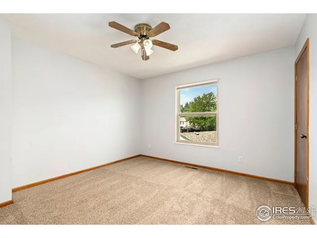 a view of an empty room with window