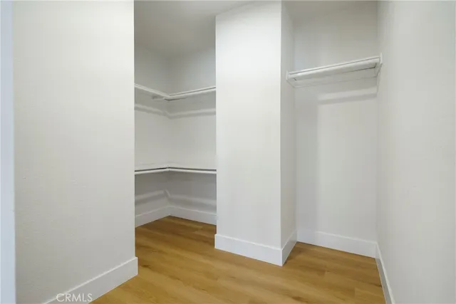 a balcony with a table and chairs