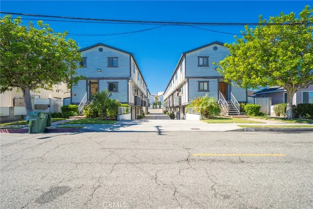 a view of street with large buildings