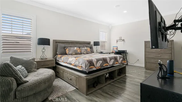 a bed room with a bed and a couch