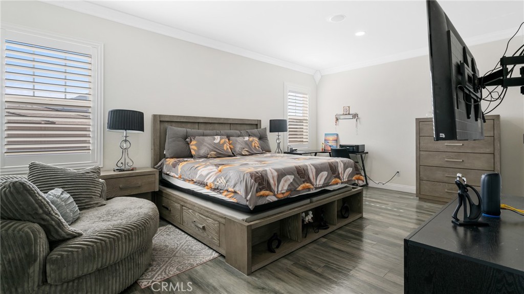 19743 Clementine Court Riverside, CA 92507 - Photo 14 of 31 a bed room with a bed and a couch