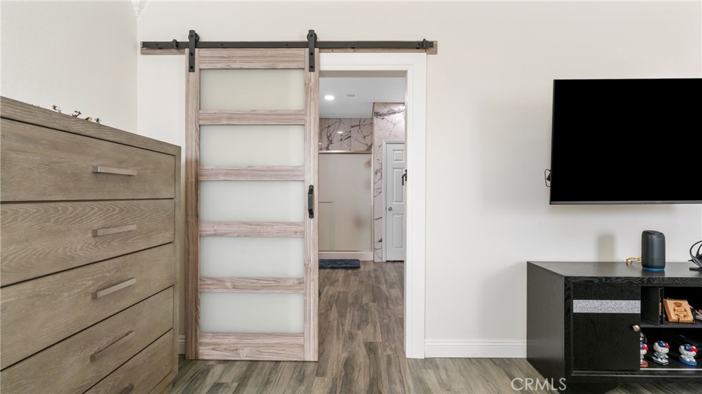 19743 Clementine Court Riverside, CA 92507 - Photo 16 of 31 a bathroom with a shower and a mirror