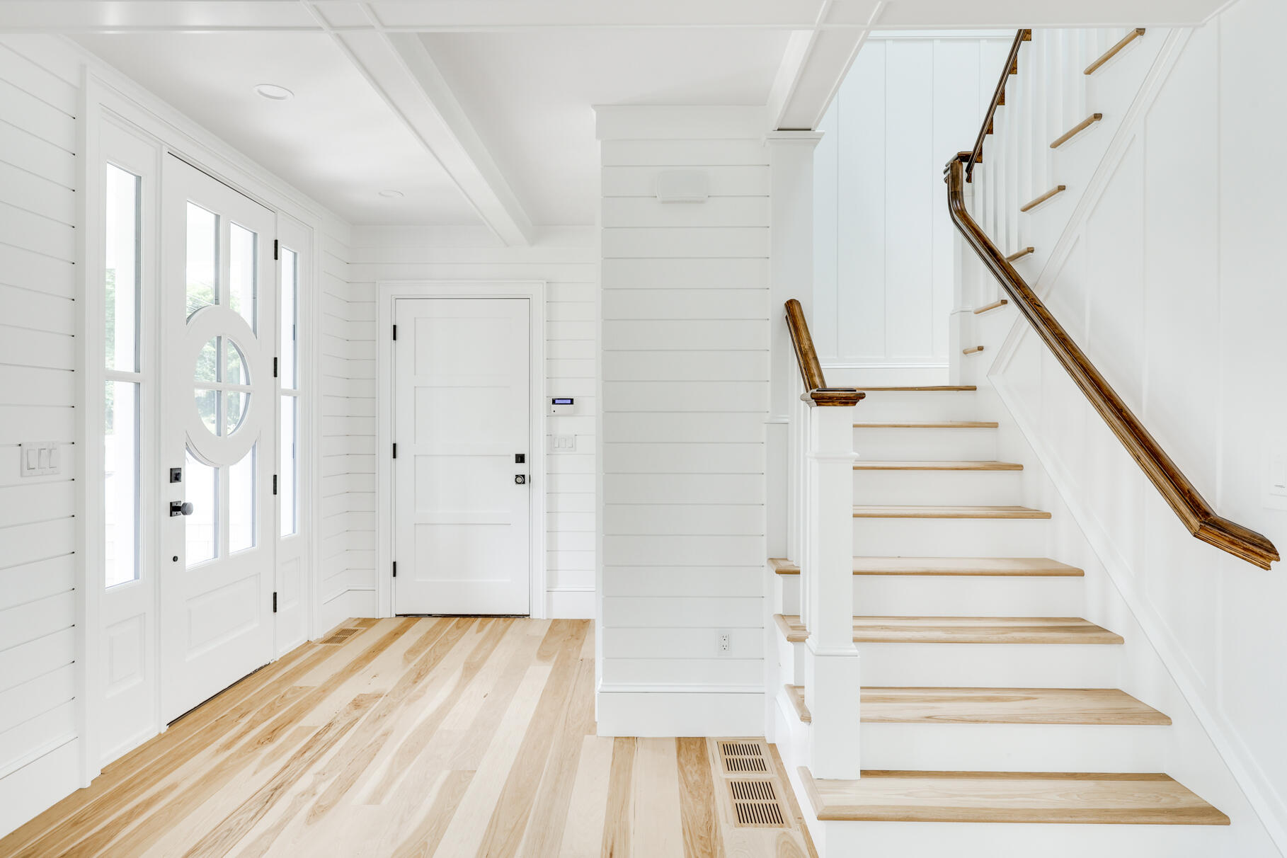 14 Pond View Lane Chatham, MA 02633 - Photo 15 of 30 a view of entryway with wooden floor and stairs
