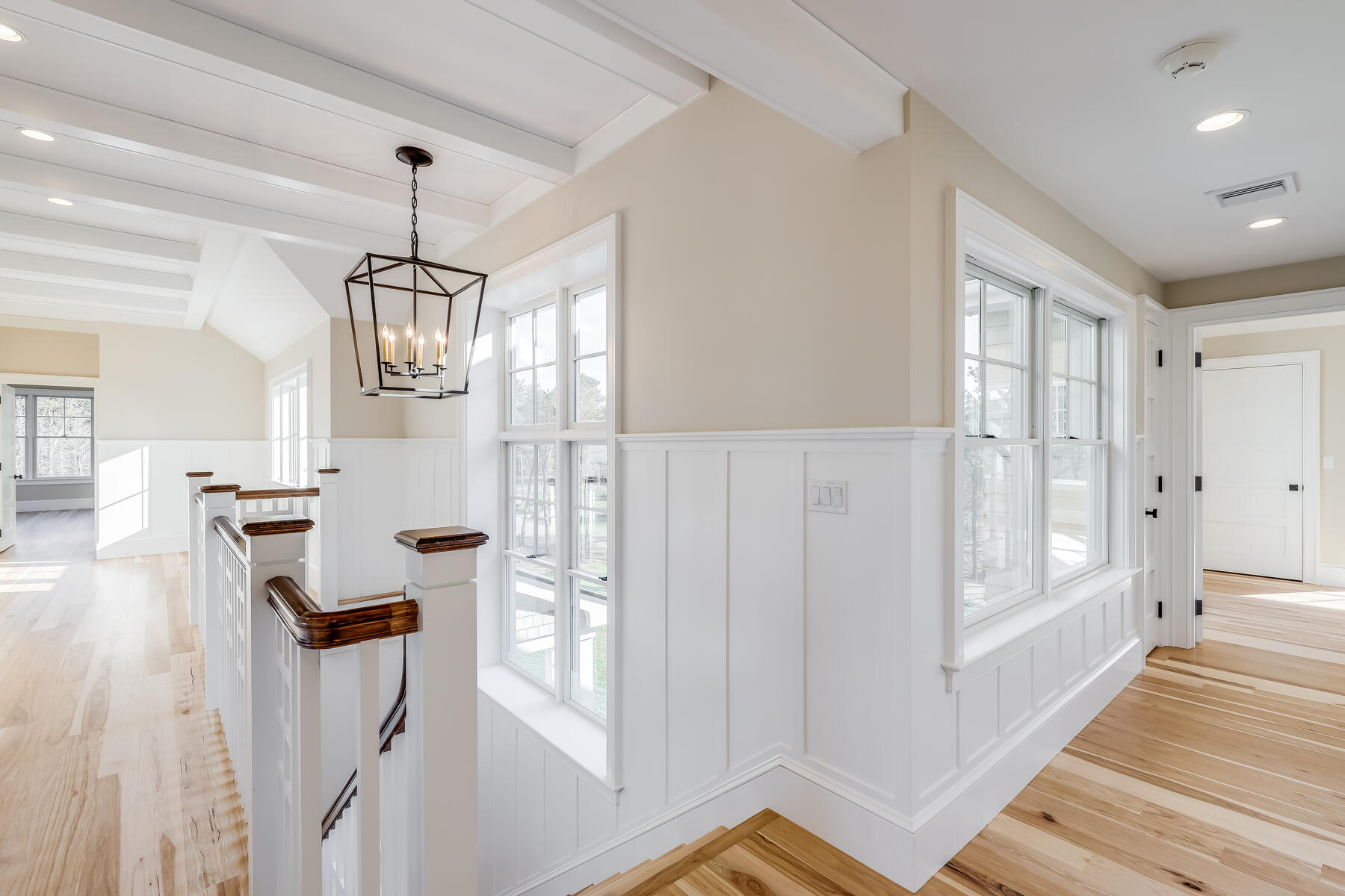 14 Pond View Lane Chatham, MA 02633 - Photo 24 of 30 a view of empty room with wooden floor and fan