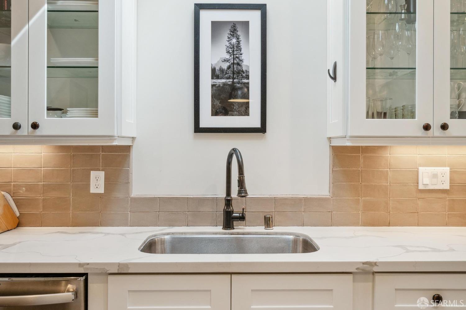 226 Roosevelt Way San Francisco, CA 94114 - Photo 24 of 65 a kitchen with granite countertop a sink and a window