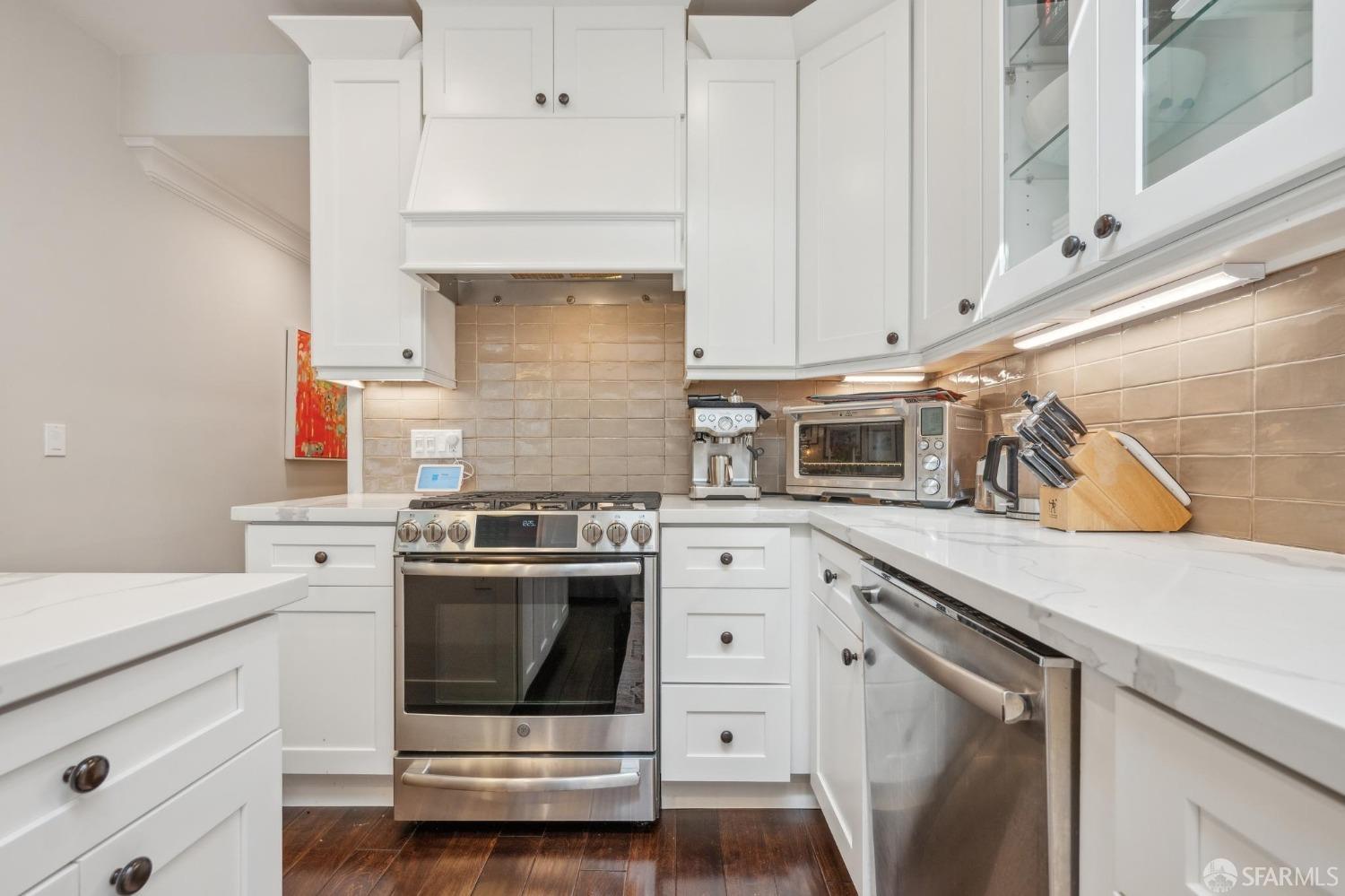 226 Roosevelt Way San Francisco, CA 94114 - Photo 25 of 65 a kitchen with stainless steel appliances granite countertop a sink and a stove