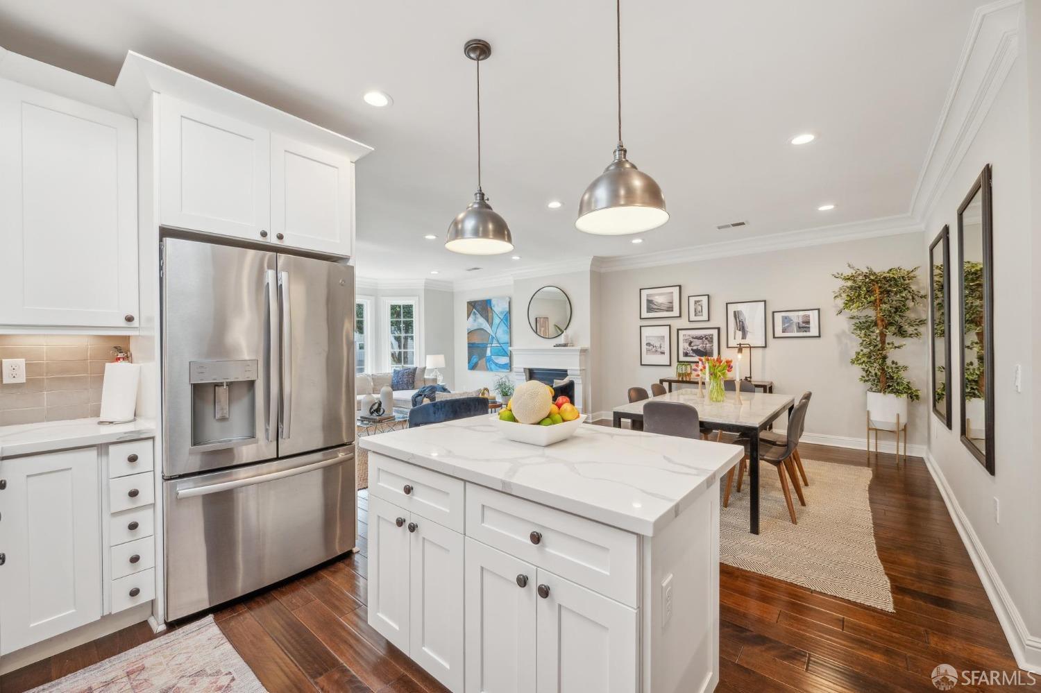 226 Roosevelt Way San Francisco, CA 94114 - Photo 26 of 65 a kitchen with white cabinets and stainless steel appliances