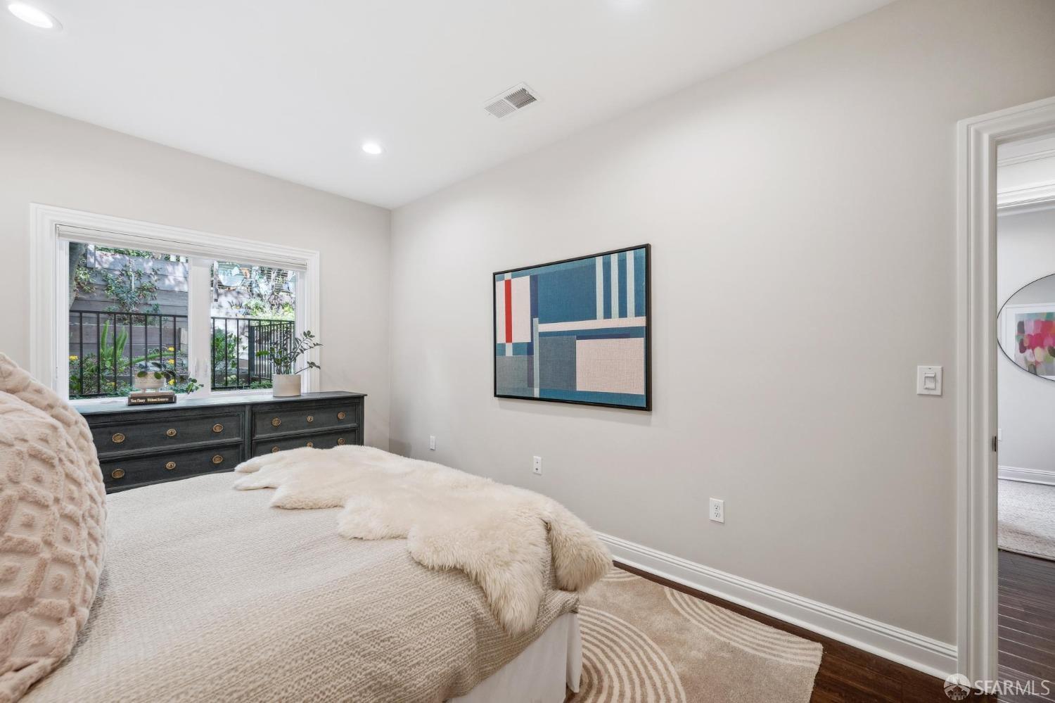 226 Roosevelt Way San Francisco, CA 94114 - Photo 31 of 65 a bedroom with a bed and a window