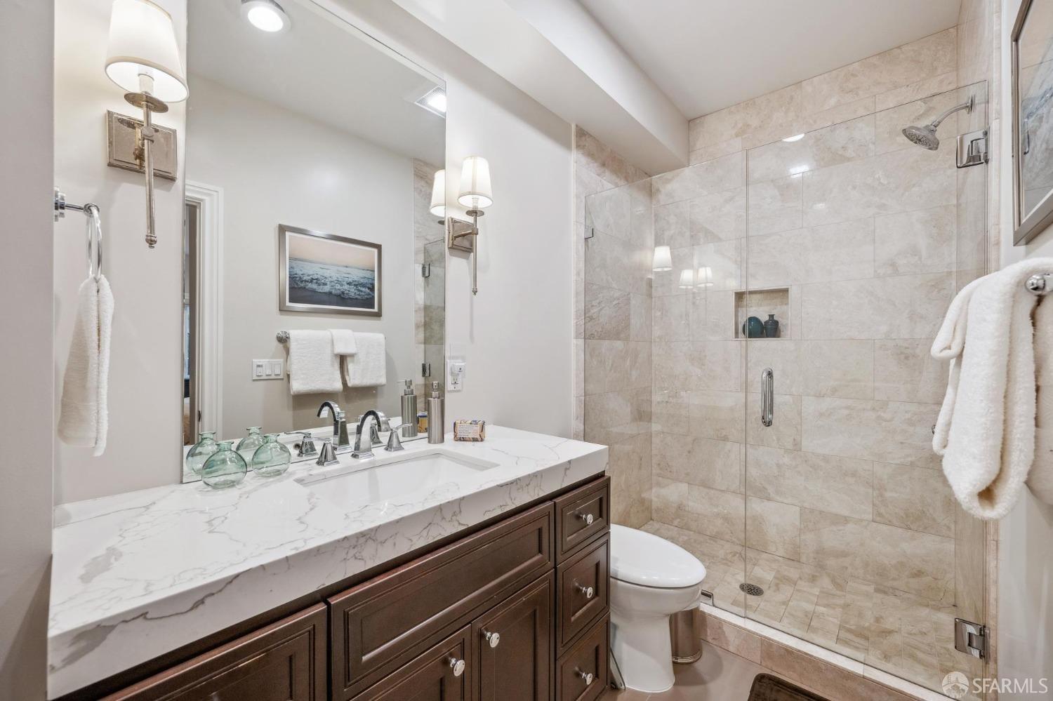 226 Roosevelt Way San Francisco, CA 94114 - Photo 34 of 65 a bathroom with a granite countertop sink toilet and shower