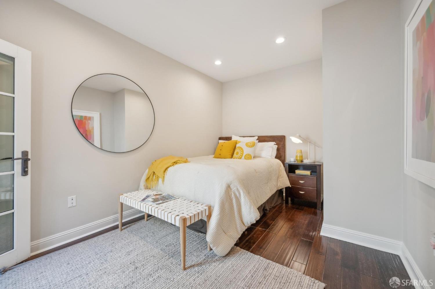 226 Roosevelt Way San Francisco, CA 94114 - Photo 39 of 65 a bedroom with a bed and a mirror