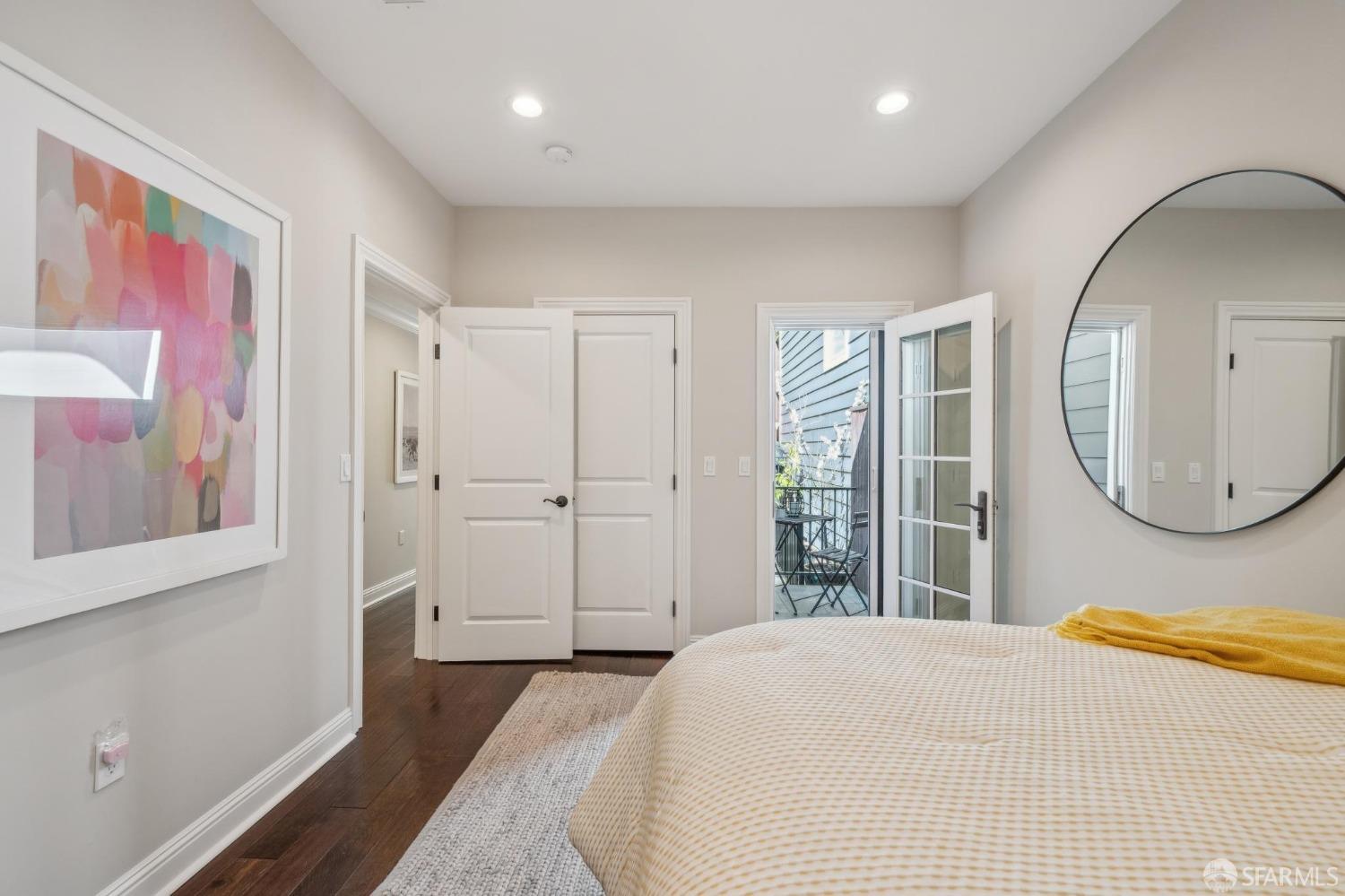 226 Roosevelt Way San Francisco, CA 94114 - Photo 40 of 65 a bedroom with a bed and a painting on the wall