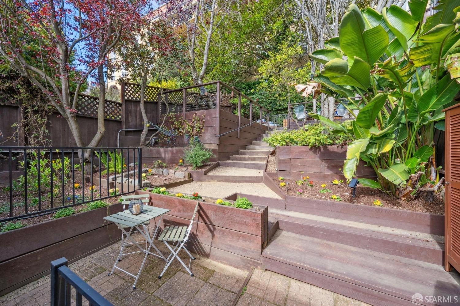 226 Roosevelt Way San Francisco, CA 94114 - Photo 45 of 65 a view of a patio with table and chairs and potted plants