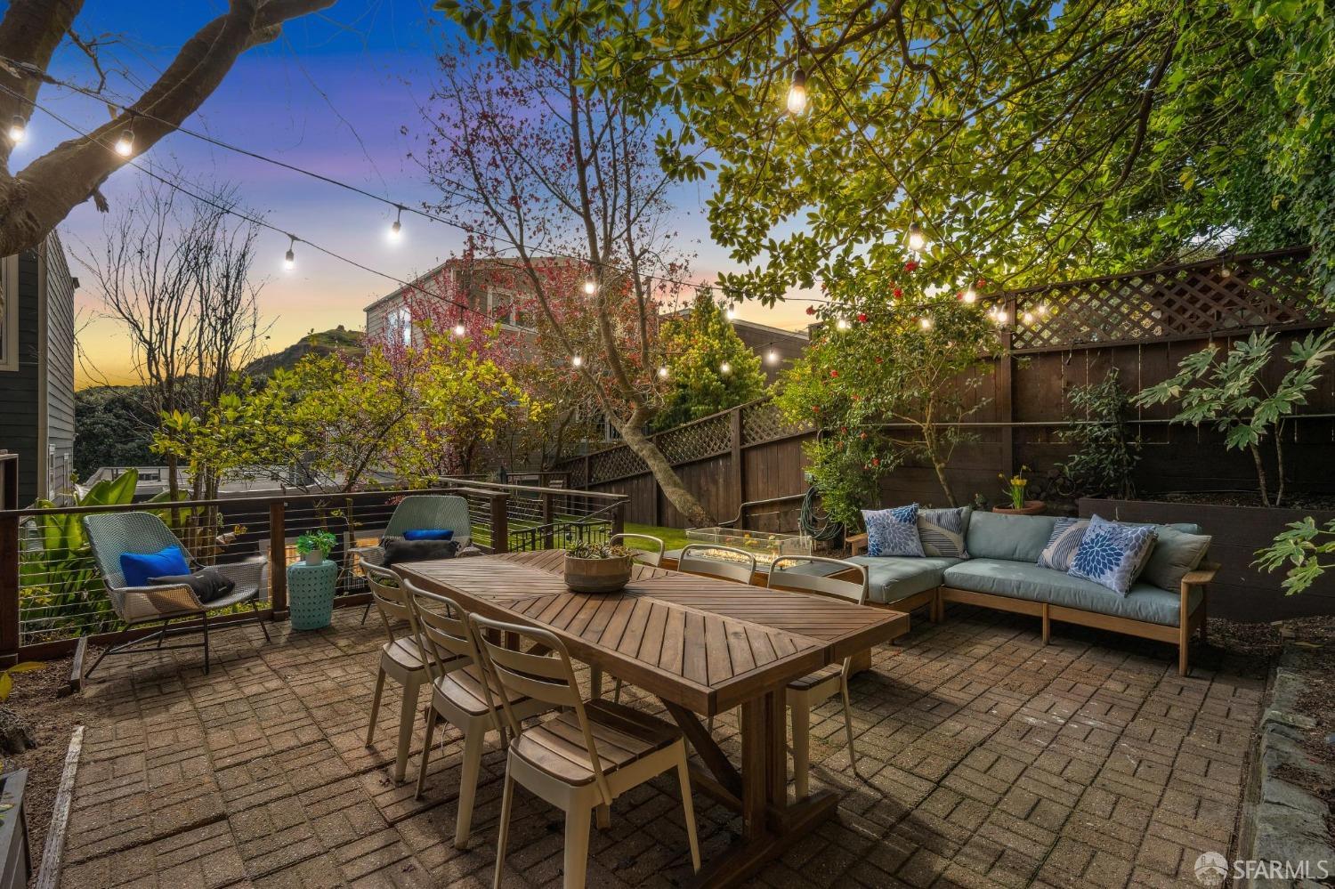 226 Roosevelt Way San Francisco, CA 94114 - Photo 65 of 65 a backyard of a house with table and chairs