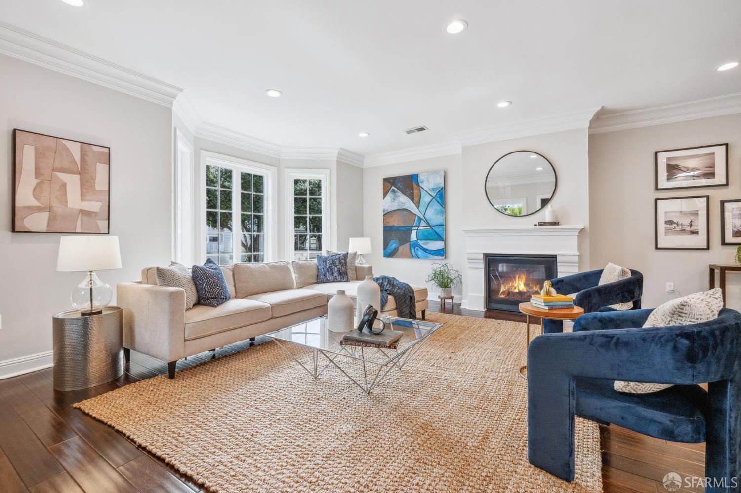 226 Roosevelt Way San Francisco, CA 94114 - Photo 7 of 65 a living room with furniture a fireplace and a window