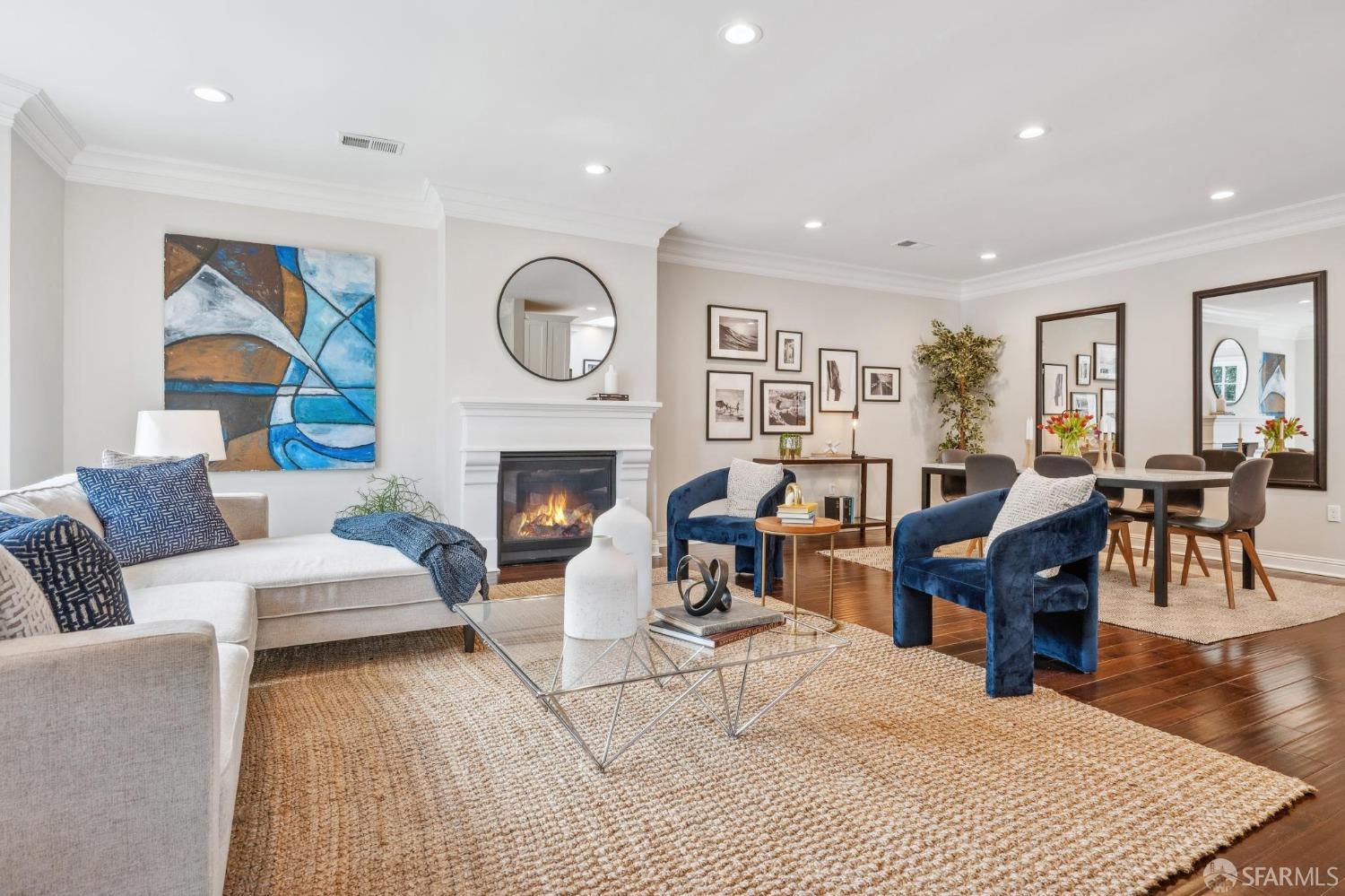 226 Roosevelt Way San Francisco, CA 94114 - Photo 9 of 65 a living room with furniture a fireplace and wooden floor