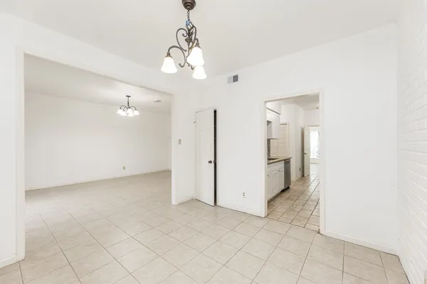 a view of a chandelier and entryway